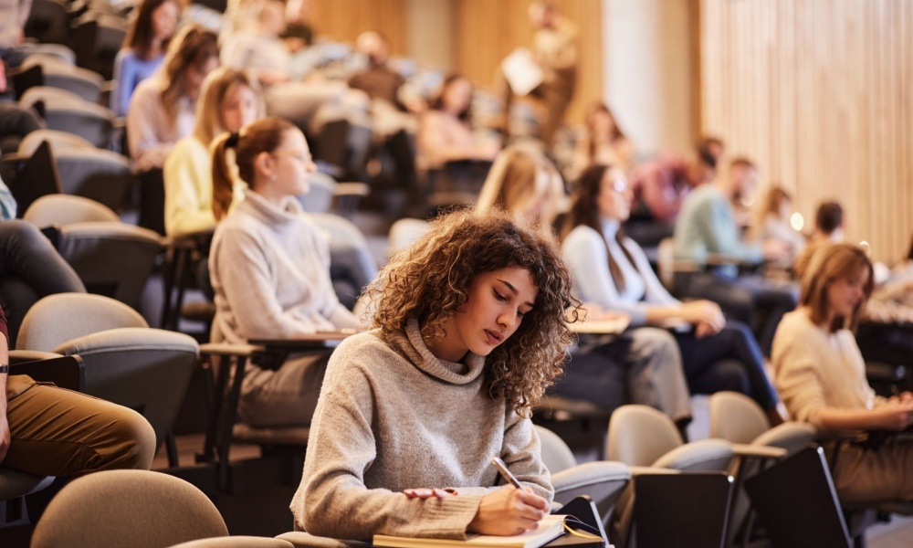 student in college class