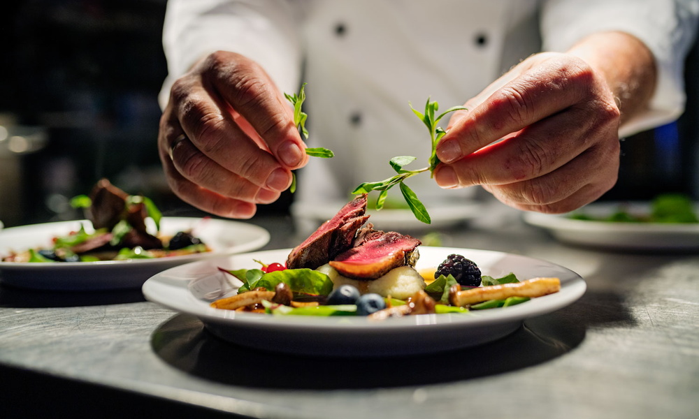 Chef putting together a dish